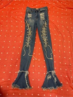 Loverly Fit Distressed Lace-Up Flare Jeans